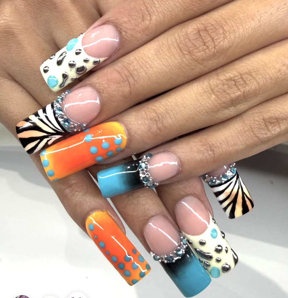 Long square nails in orange, turquoise and zebra print with crystals